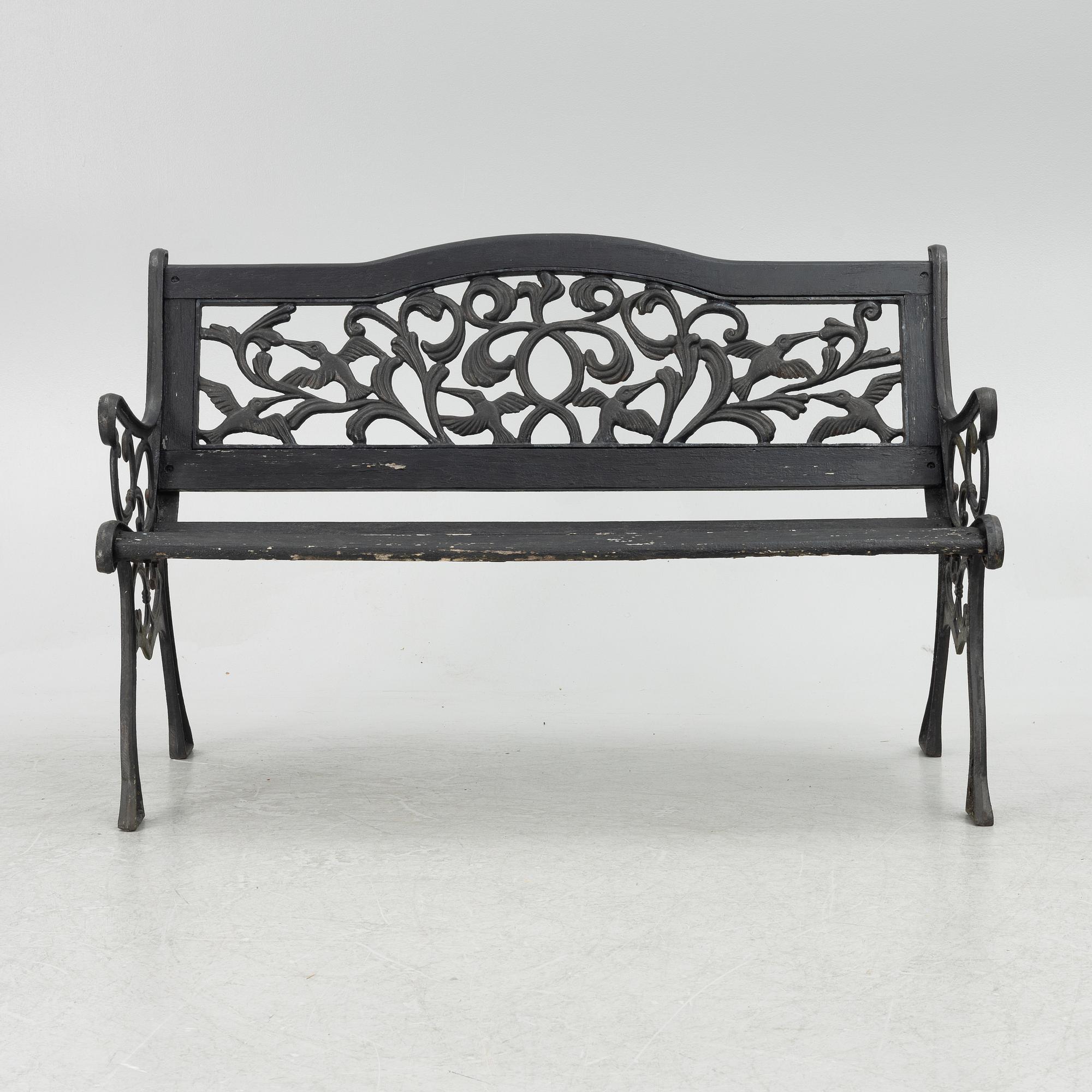 A garden bench, late 20th century.