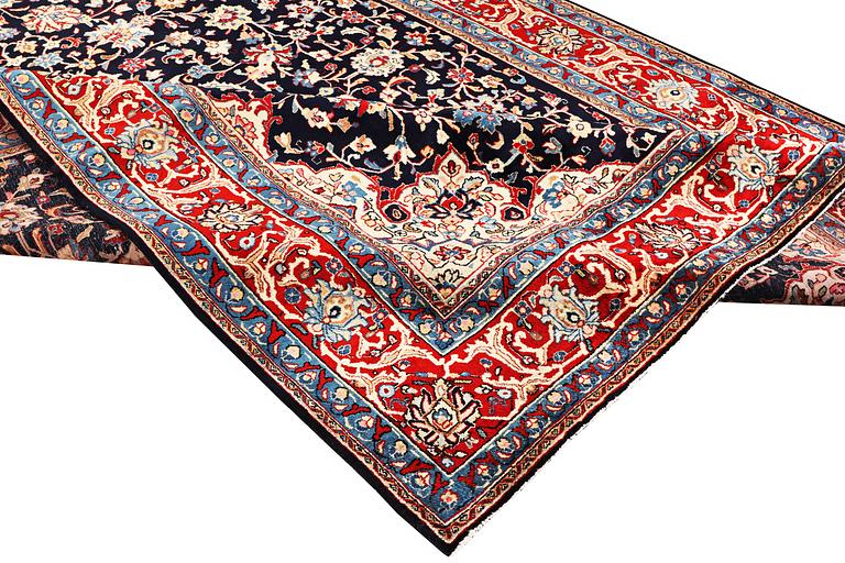 A carpet, Mashad, c. 386 x 259 cm.