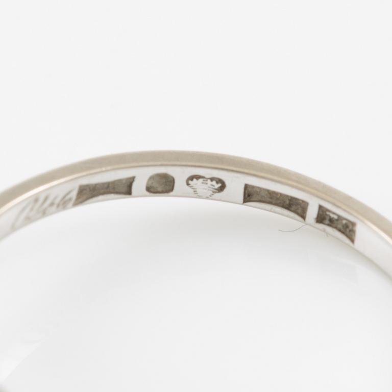 A ring and a pair of earrings in 18K white gold set with round brilliant-cut and octagonal-cut diamonds.