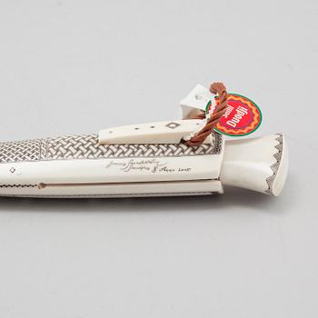 A knife by Jonas Sandström, signed and dated 2005.