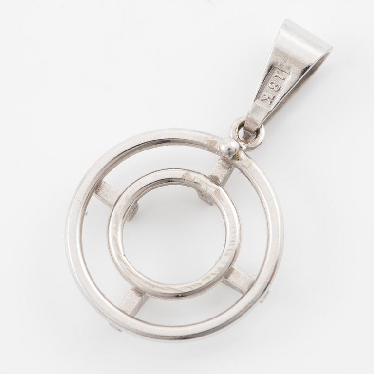 Brooch/pendant, 18K white gold with sapphire and brilliant-cut diamonds.