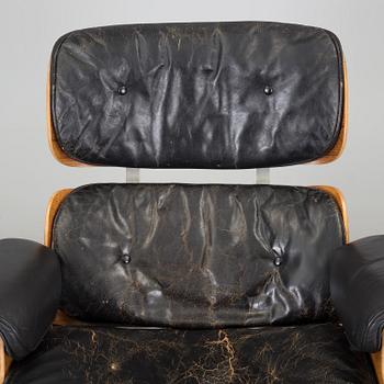 An easy chair and ottoman by Charles & Ray Eames, Herman Miller, USA, produced with licence by Hille, London.