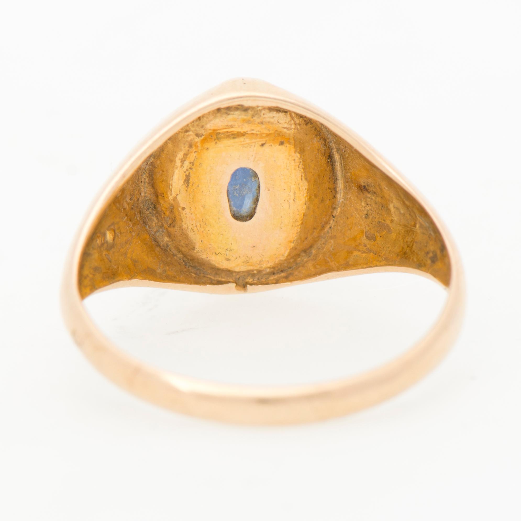 A RING, cabochon cut sapphire, 14K gold.