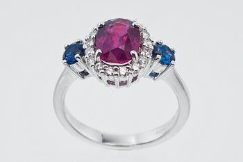 A PINK SAPPHIRE RING.