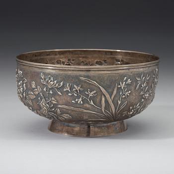 An export silver bowl, Shanghai, bears marks Shanghai Woshing, circa 1910.