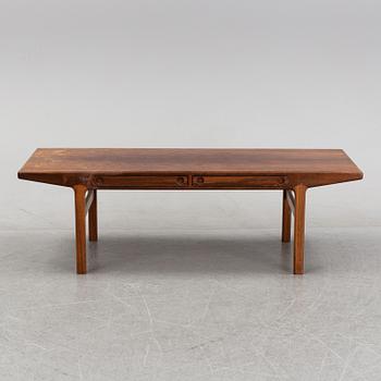 A 1950's/60's rosewood veneered coffee table.