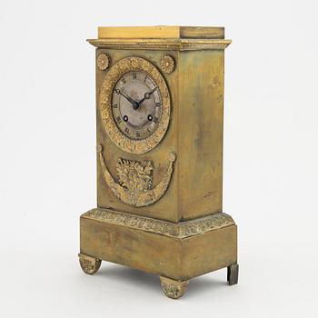 An Empire mantle clock, mid 19th century.