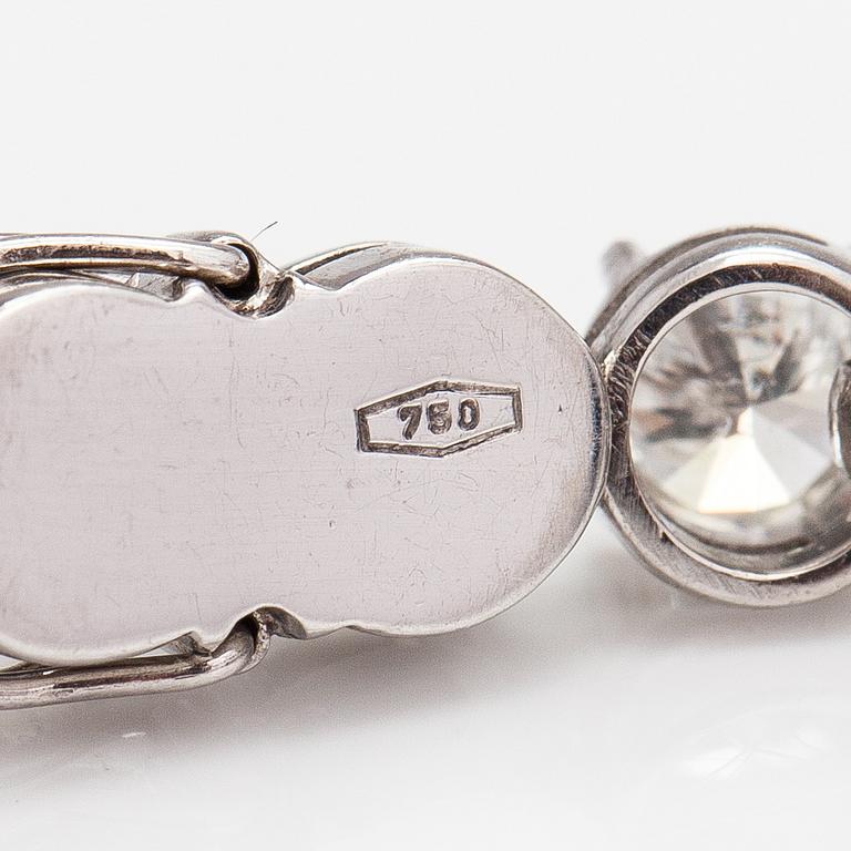 Tennisrannekoru, 18K valkokultaa ja briljanttihiottuja timantteja n. 7.50 ct yht.