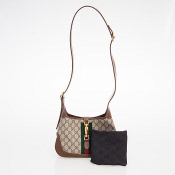 Gucci, a monogram 'Jackie' Bag.