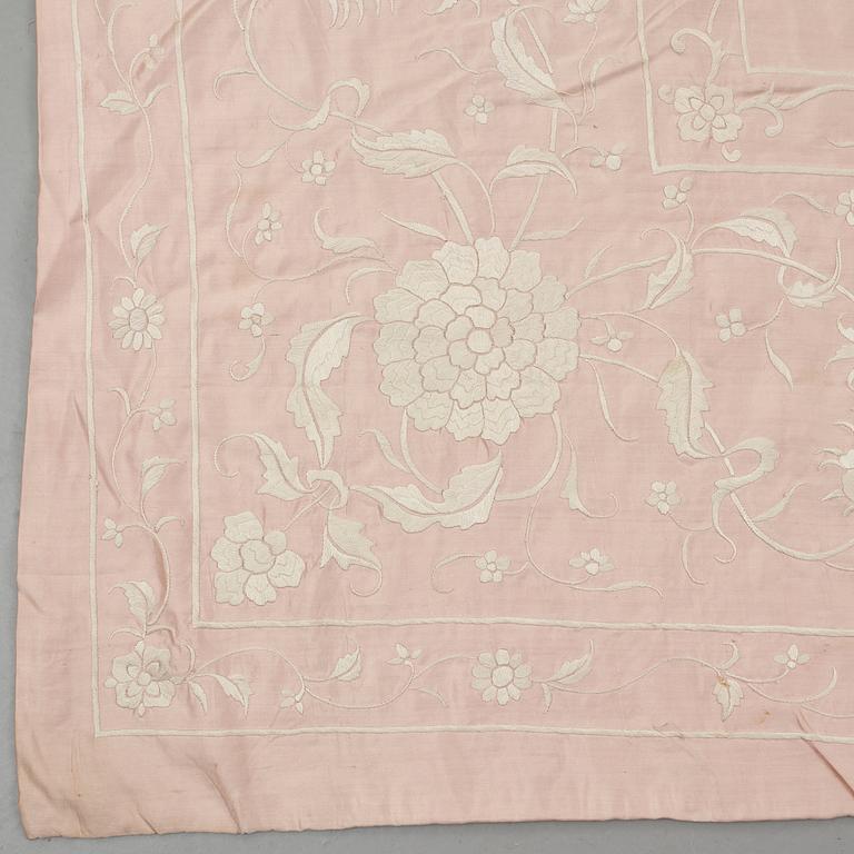 An embroidered silk bed spread, Qing dynasty, circa 1900.