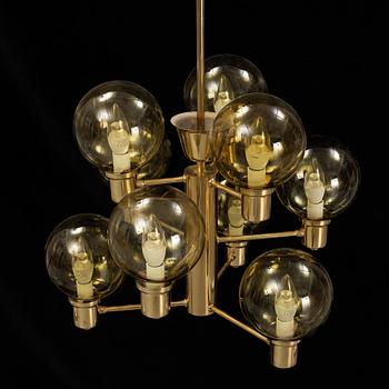 A 1960's brass and glass ceiling light.