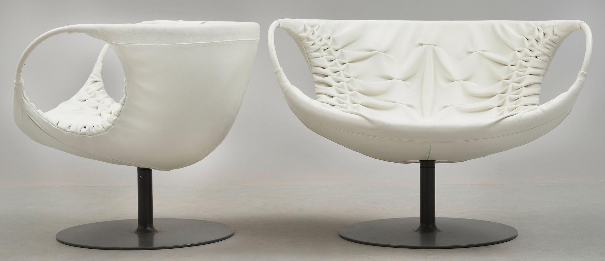 A pair of Patricia Urquiola 'Smock' steel and white leather easy chairs, Moroso, Italy.