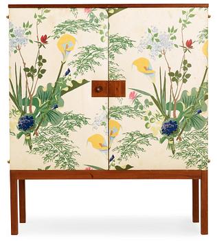 682. A Josef Frank mahogany cabinet, the doors and sides upholstered with floral chintz fabric, Svenskt Tenn 1940's-50's.