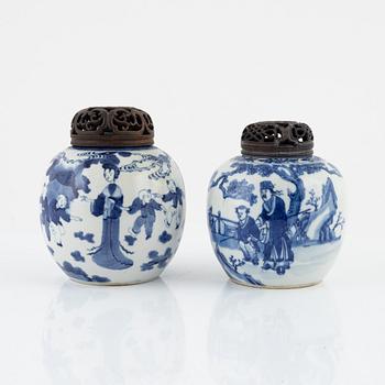 Two similar blue and white lidded urns, China, 19th century.