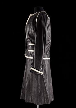 A black leather two-piece costume by Chanel from spring 2005.