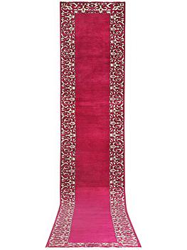 A Persian runner carpet, c. 490 x 67 cm.