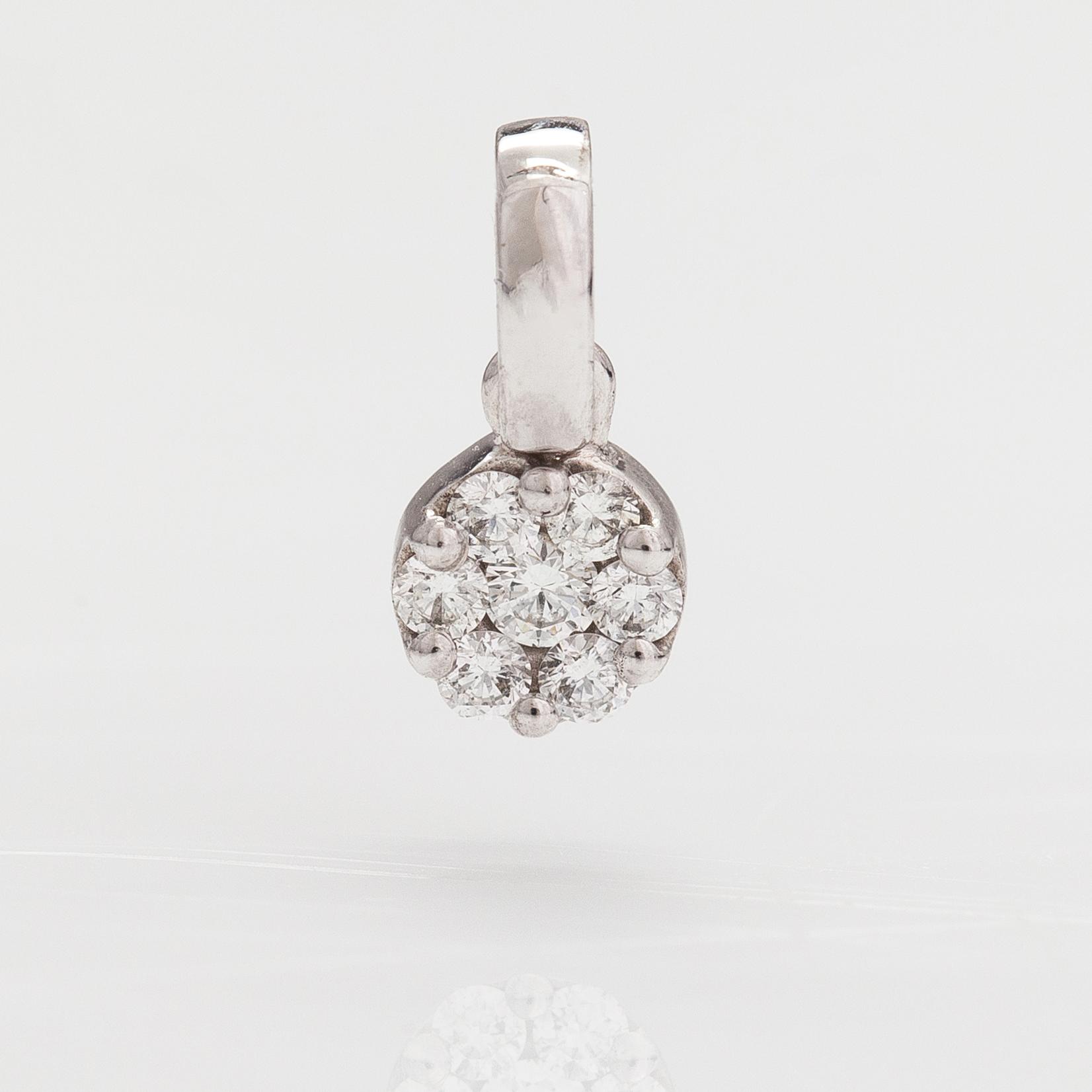 Hänge, 14K vitguld, diamanter ca 0.14 ct tot enl gravyr. Rubens, Helsingfors.
