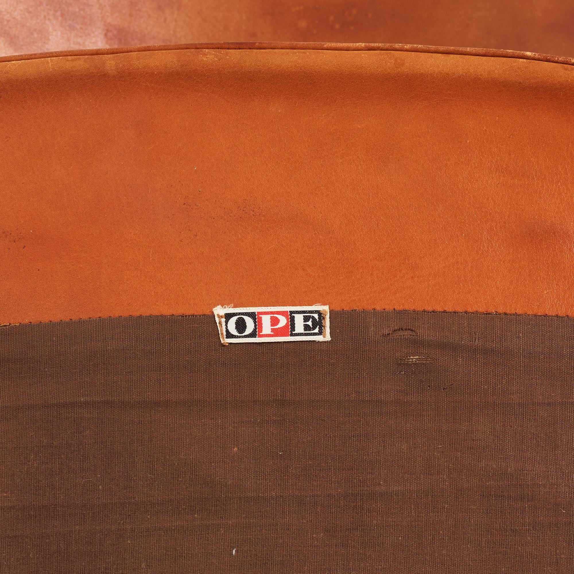 Ib Kofod-Larsen, a teak and cognac coloured leather 'Sälen' easy chair, Olof Perssons Fåtöljindustri (OPE), Sweden, 1950-60s.