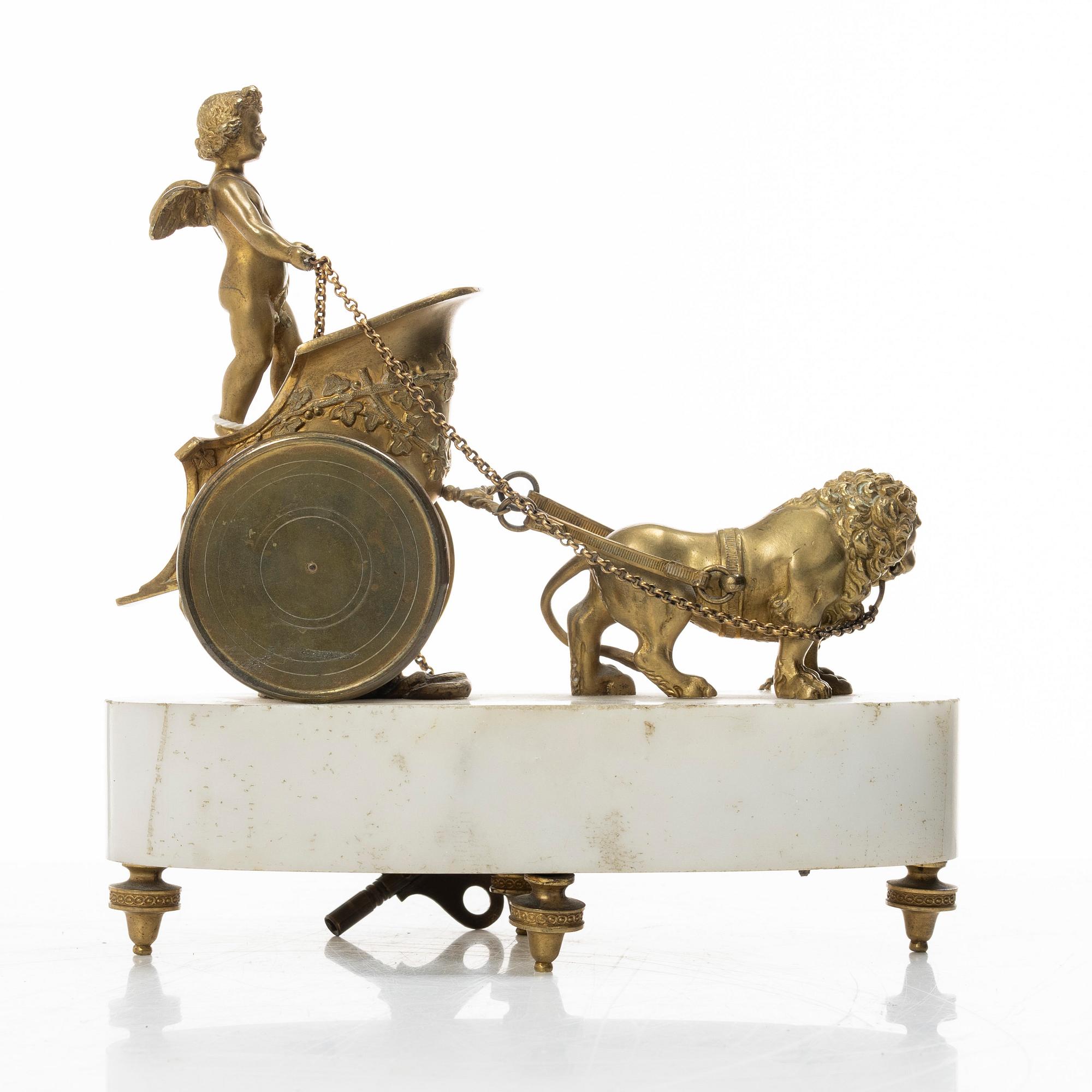 An Empire table clock, likely Northern Europe, early 19th century.