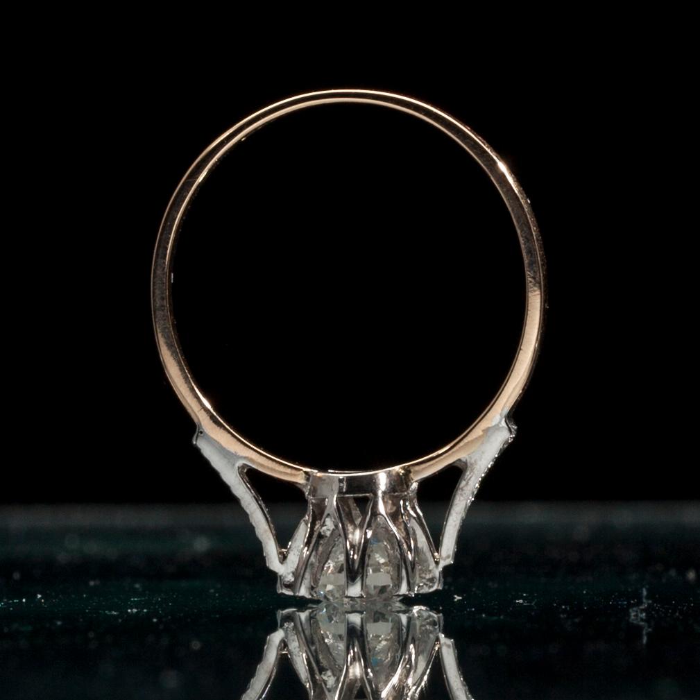 RING, guld 14K, briljantslipade diamanter. Mittstenen 1,01 ct, G/I, tot. 4 sidostenar 0,04 ct, H/SI. Vikt 2,9 g.