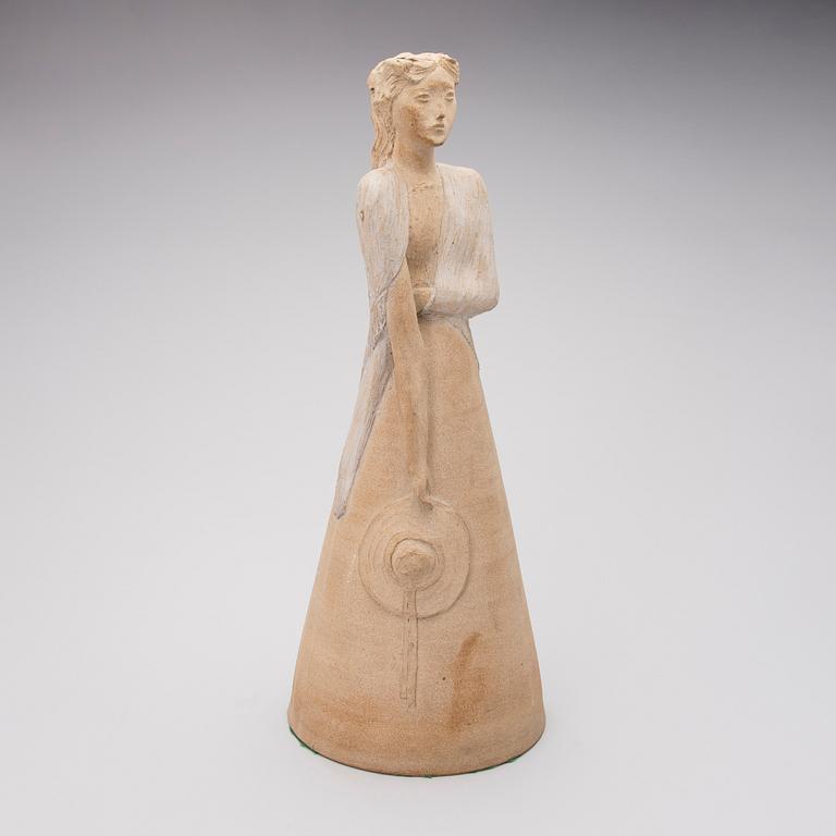 A signed stoneware sculpture.