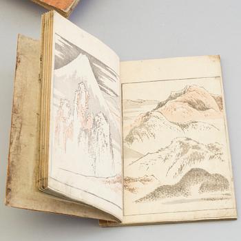 13 Japanese woodblock printed books with illustrations, 19th century.