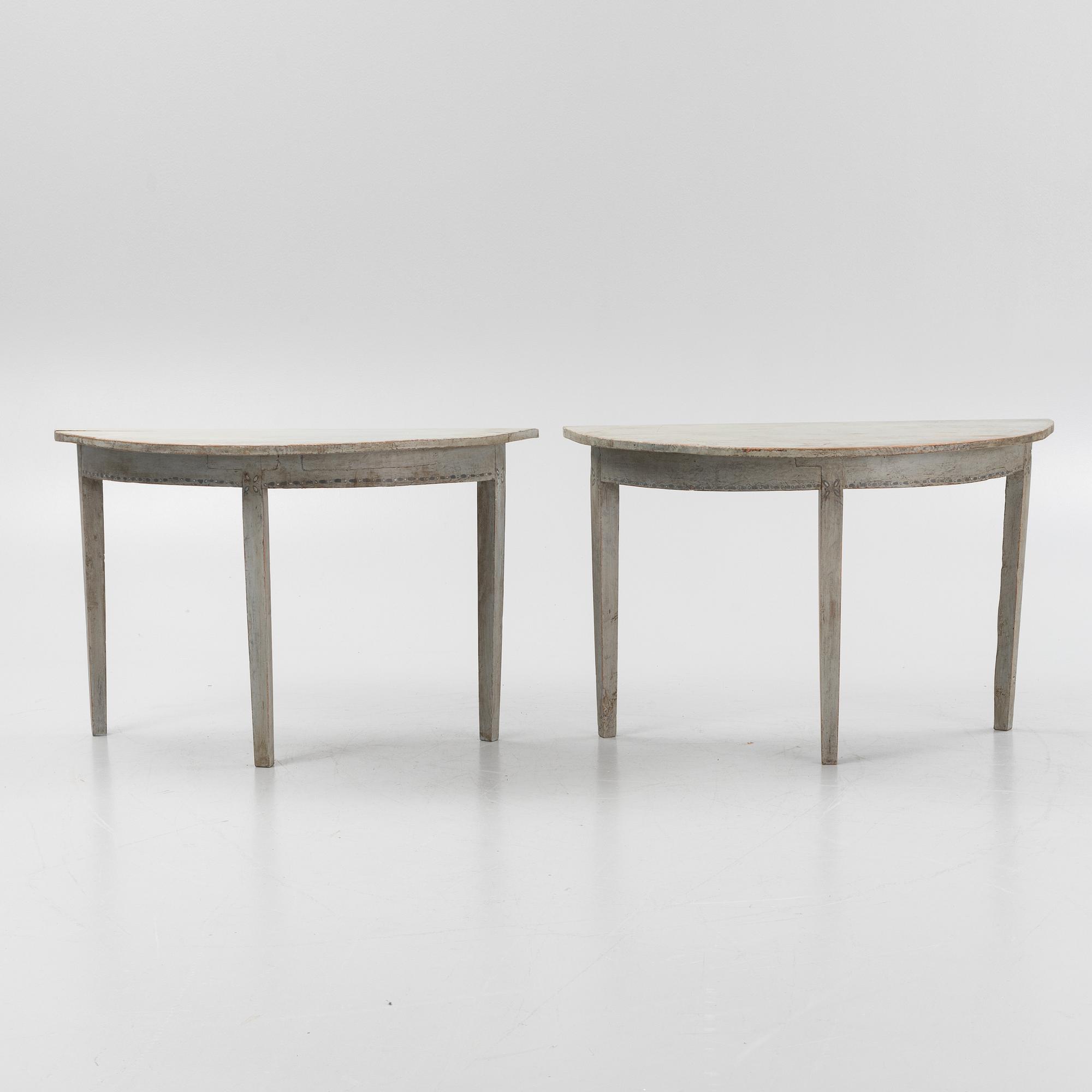 A painted pair of side tables, 19th Century.