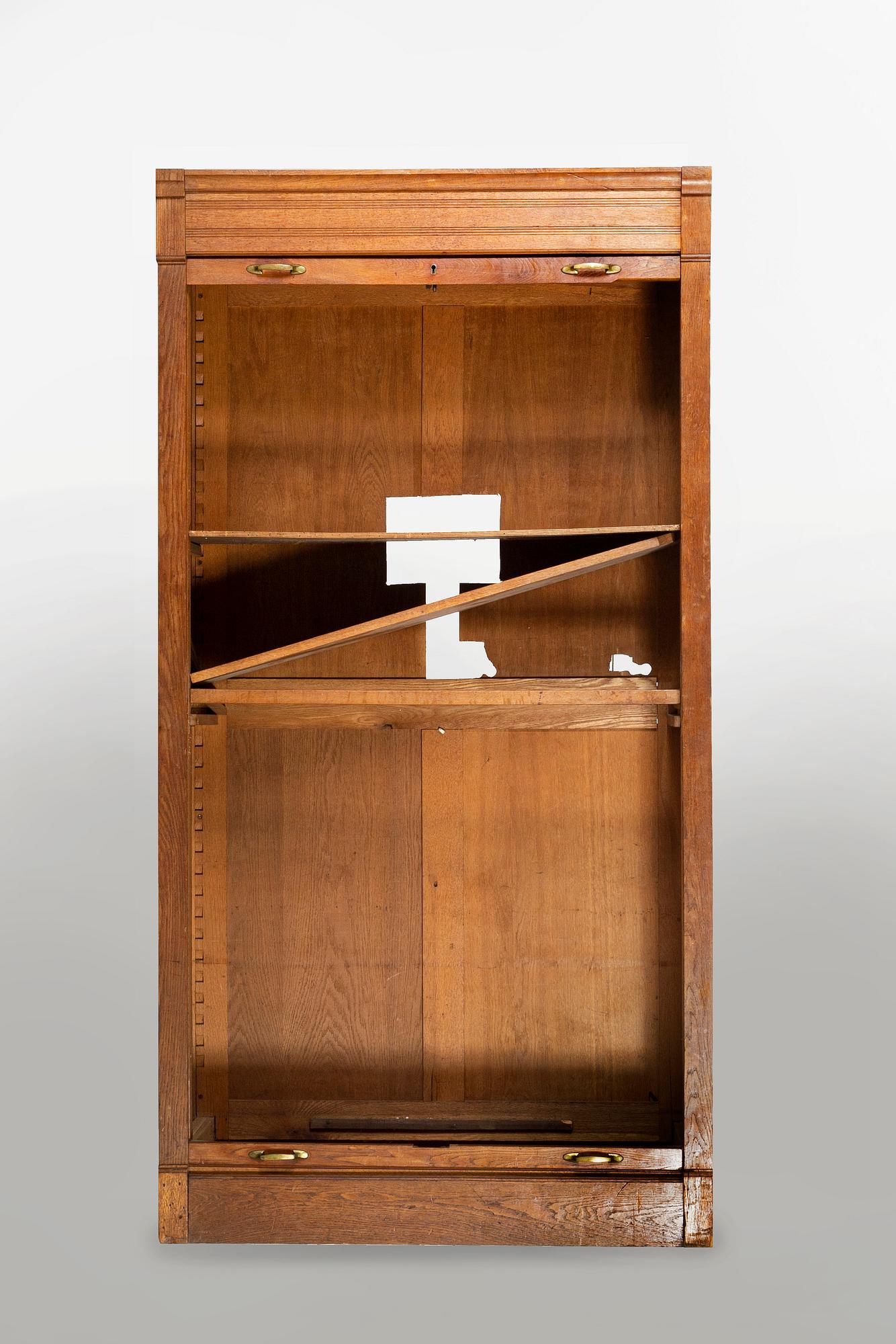 A mid 20th century oak archive cabinet.