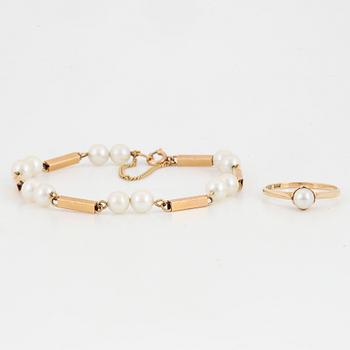 18K gold pearl bracelet and ring.