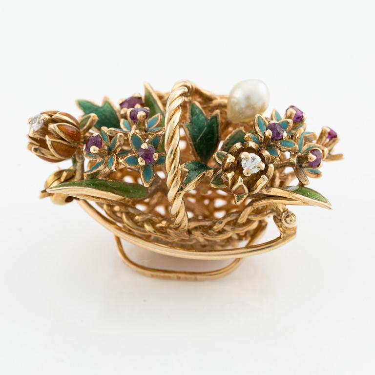 A basket brooch in 18K gold and enamel with diamonds designed by Barbro Littmarck, W.A. Bolin Stockholm 1950.