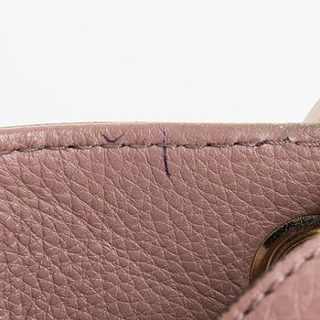 Gucci, a 'Bamboo shopper' bag.
