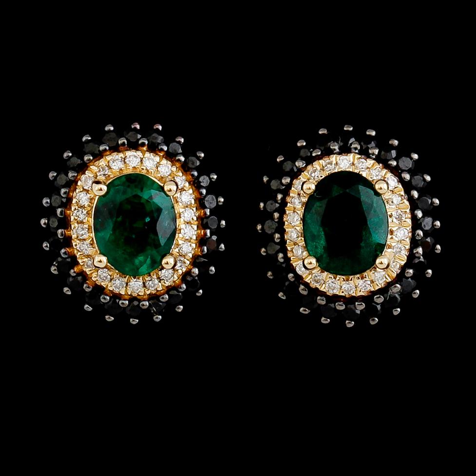 ÖRHÄNGEN, 1 par, 18 k guld, smaragder tot ca 1.18 ct och diamanter tot ca 0.61 ct.