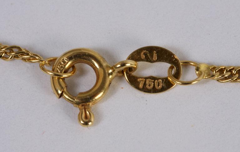 SMYCKEGARNITYR, 4 delar, 18K guld med safirer och briljanter.