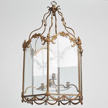 A Swedish rococo gilt-brass four-light lantern, possibly a masterpiece, Stockholm, later part of the 18th century.