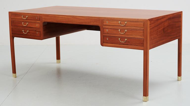An Ole Wanscher mahogany desk by A.J Iversen, Denmark 1950's.