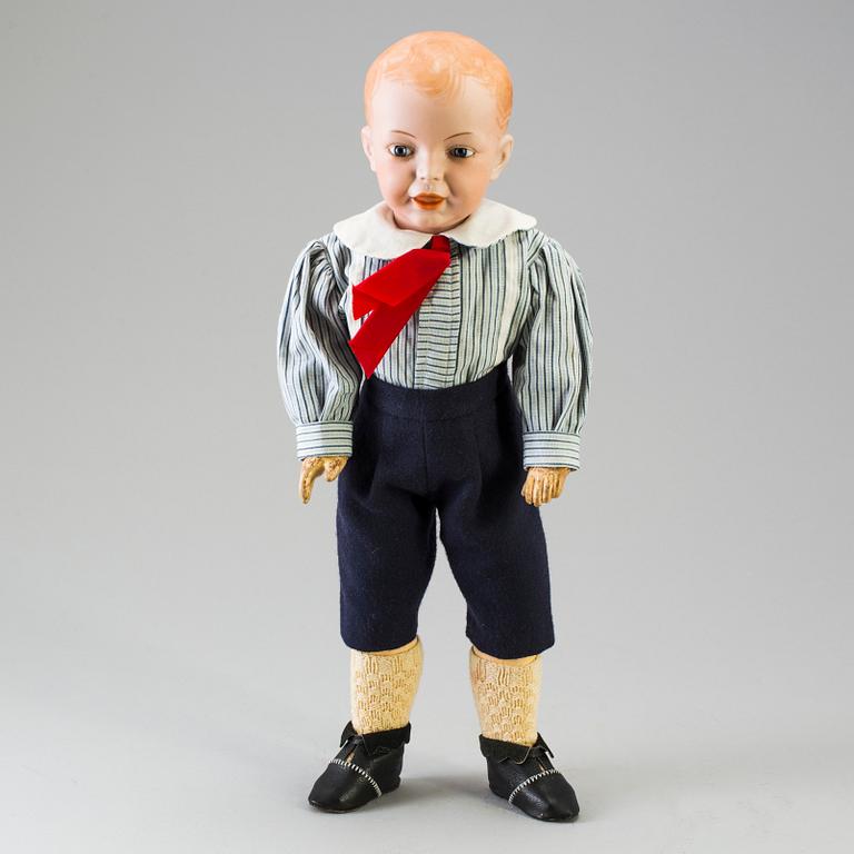 A bisque head character doll marked 226, probably France, 1910s.