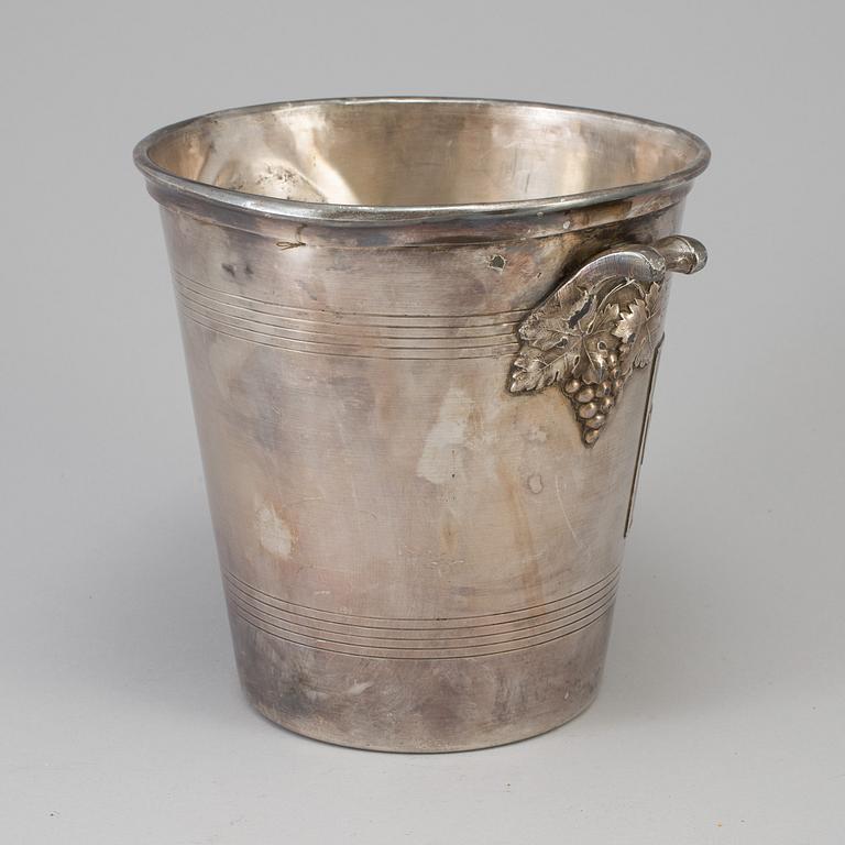 A SILVERED METAL CHAMPAGNE COOLER, mid 20th century.