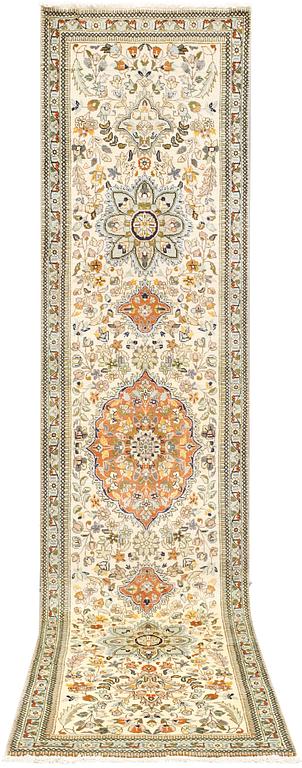 A Tabriz runner, c. 320 x 75 cm.