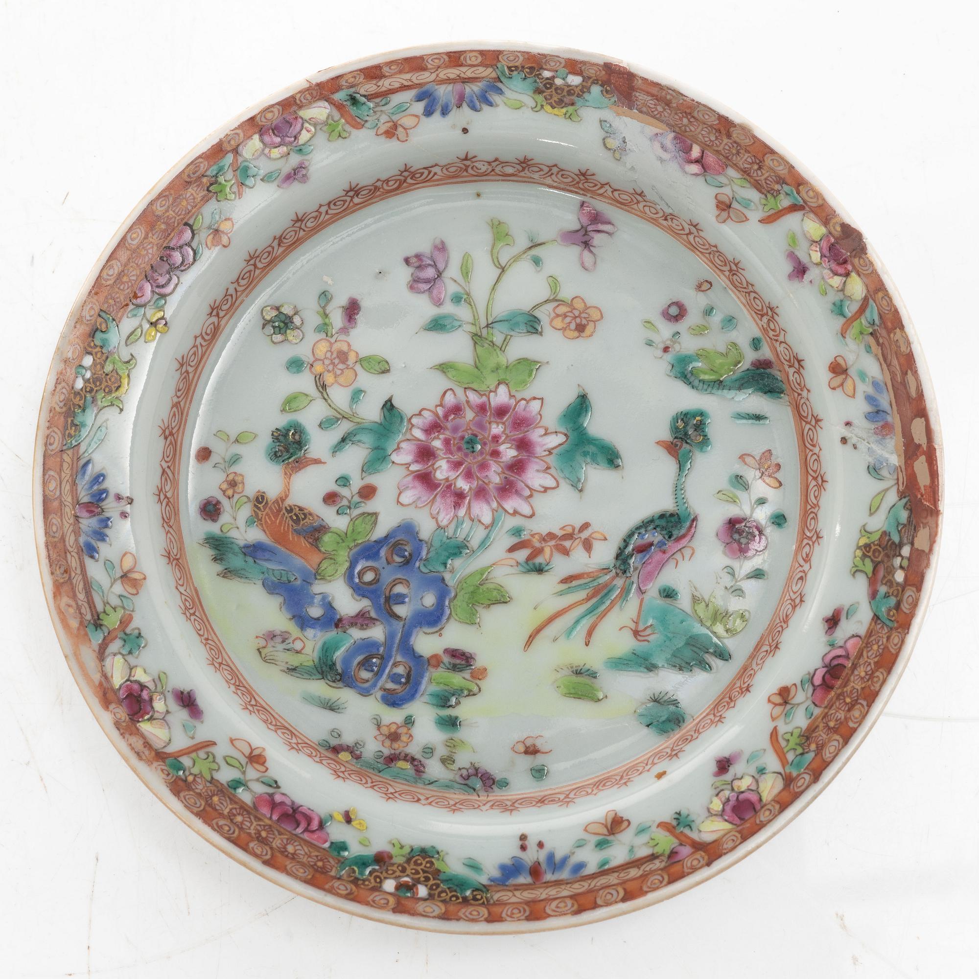 A small Chinese famille rose porcelain tureen with cover and stand, two salt cellars, Qing dynasty, Qianlong (1736-95).