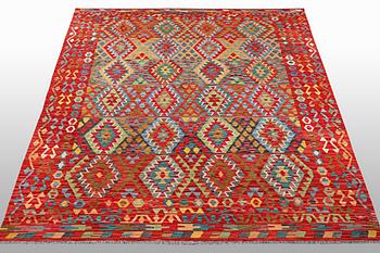 A carpet, kilim, ca 297 x 202 cm.
