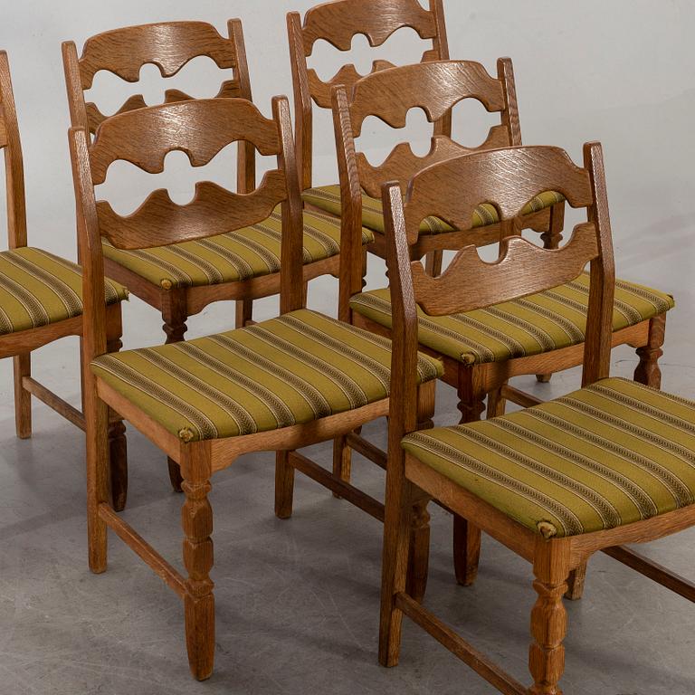 A set of six Danish Henning Kjaerulf chairs, second half of 20th century.