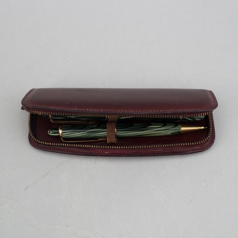 Montblanc, a fountain pen and a pencil in a leather case, 1950's.