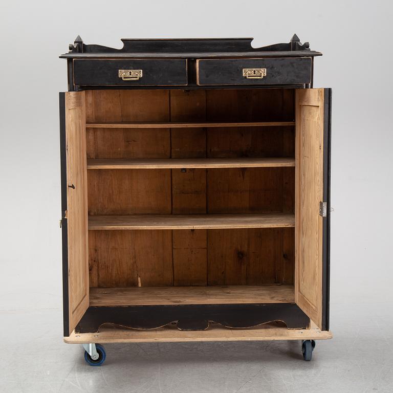 A painted cupboard, early 20th Century.