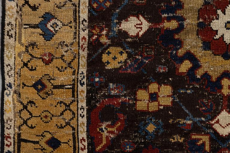 A carpet, fragment, an antique Karabagh 18th century, ca 293-300,5 x 202,5-205,5 cm.