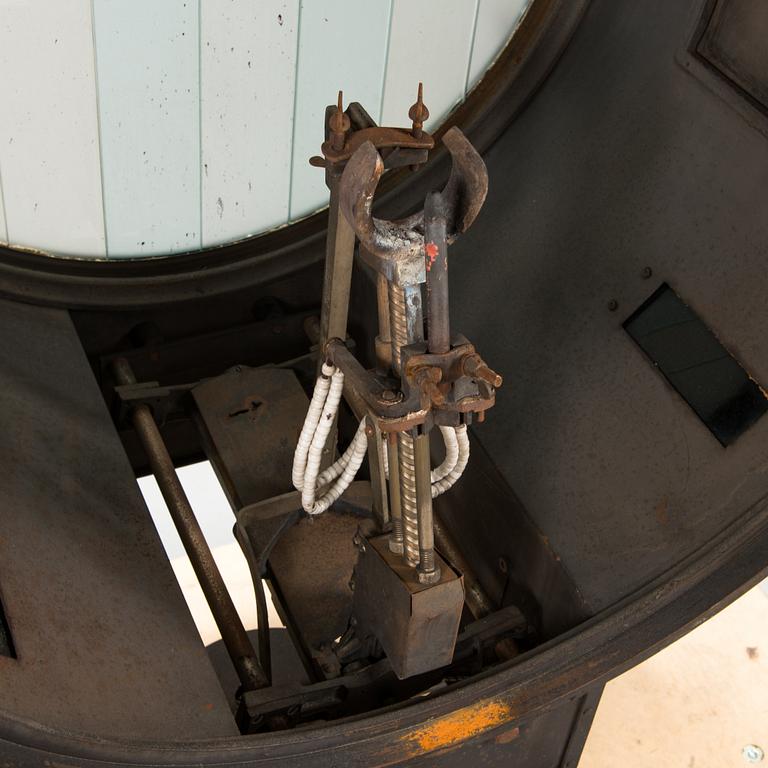 A film industry carbon arc spotlight with two boxes Kino-carbon sticks, + and -.