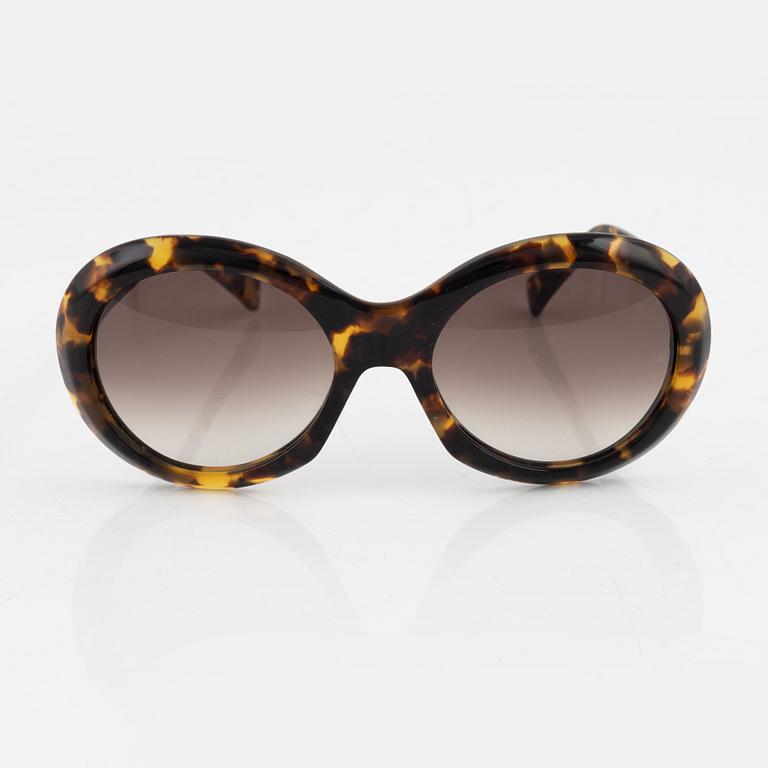 Oliver Goldsmith, a pair of "Audrey" sunglasses.