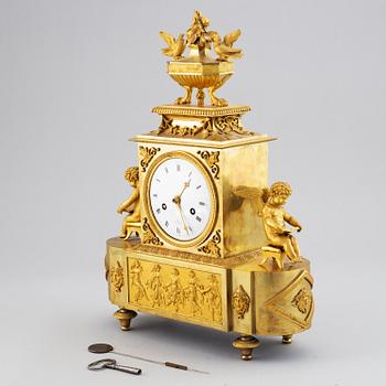 A French mantle clock, early 19th century.