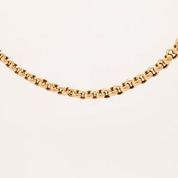 An 18K pocket watch chain.