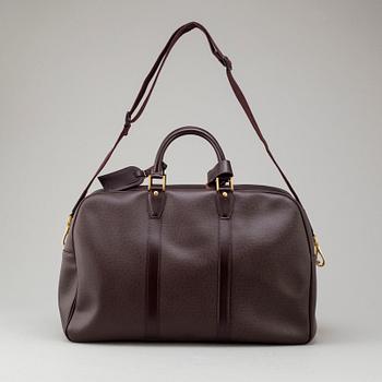 LOUIS VUITTON 'Taïga Kendall PM' bag.