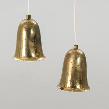 A PAR OF BRASS PENDANT LAMPS BY BORÉNS BORÅS.